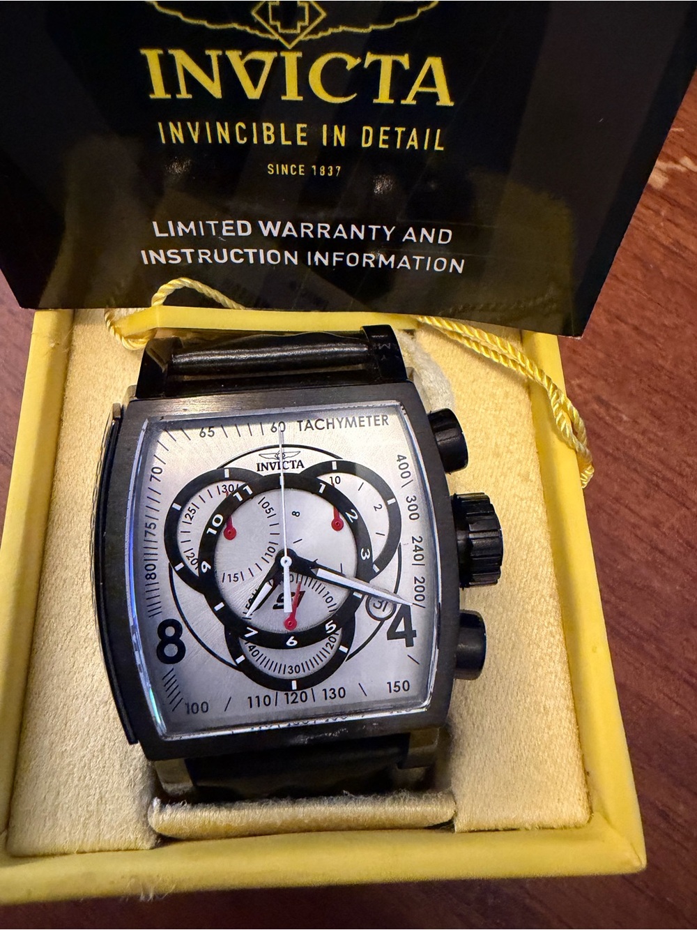 Invicta Black and Silver Chronograph Tachymeter Watch